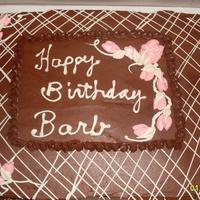 Happy Birthday Barb!!! Chocolate/orange cake with chocolate buttercream frosting. White chocolate lines and writing, buttercream flowers
