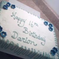 Darion Red Velvet cake with cream cheese frosting, fondant flowers