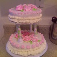 First Tierd And Fondant Cake First tierd cake did on my own. Red Velvet with a buttercream crum spread and fondant. Rose buds and roses with vines and leaves.