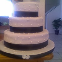 Black Ribbon With Dots Chocolate cake with chocolate mousse. covered in fondant and black satin ribbon. Couple's florist was going to add a red rose spray...