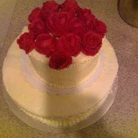 My Anniversary Cake I was in a hurry, I failed to get a smaller plate or cardboard for the top tier. The top tier was a carrot cake with cream cheese. the...