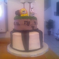 Jungle Theme Cake Client couldn't buy the fondant, so I had to do the entire cake in buttercream. Still, LOVED doing it!!!! I painted cheap clay zoo...