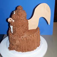 Squirrel Sittin On A Stump Everything is edible. The tail was gumpaste....I wanted to make it fluffy but ran out of time. It was for my hubby's bday. He loves to...