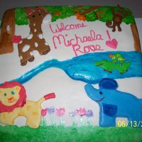 Fondant With Color Flow Animals cake I did for some friends, the animals are color flow the scenery was colored on with edible markers