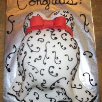 Baby Bump Cake 8 inch stacked rounds with mini balls for boobs.