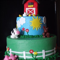 Farm 6/10inch buttercream with fondant accents... RKT barn thats leaning.. I love making these.. The animals are so fun to make:) TFL