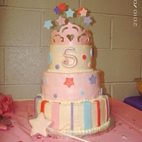 The Princess Tiara And Wand Cake This is a 3 tier cake iced with buttercream with fondant stripes, stars and dots on the cake. The tiara, wand and # 5 are also made from...