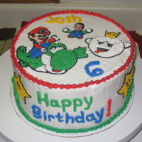 Mario Cake My nephew's love having their pictures on their cakes, so this one had my nephew's face on it. He loved it!
