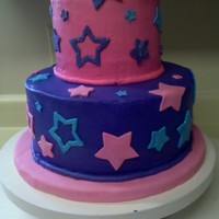 Abby Cadabby A cake done for an Abby Cadabby (from Sesame Street) themed party. Iced in buttercream with fondant stars. Fondant stars had disco dust...