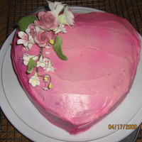 Heart & Flowers I made this for my mom's birthday. Simple, but she still loved it. The frosting was regular vanilla frosting and I used the pink spray...