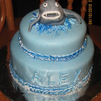 Shark I admit, I'm horrible at coming up with ideas, as I found a few shark cakes on here and jammed the ideas I got together to make this....