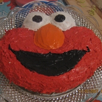 Elmo used the cake pan, but I'm still proud of the way I decorated it. It was for my daughter's second birthday.