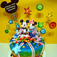 Mickey Mouse Edible image cutouts used for characters and black Mickey Mouse cutout, balls are gobstoppers, cake was airbrushed,fondant, edible markers...