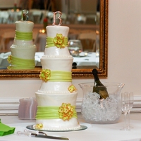 Hydrangea Wedding Cake Each tier was about 8 or 9 inches tall. Each tier had 4 two in. cakes. Starting from the bottom tier it went like this, 10", 8",...