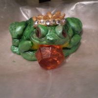 21St Birthday Cake Frog is all fondant, shoe is mexican paste, details on shoe are wafer paper. Pillow cake. Tassels are rainbow strings candy. Also has a...