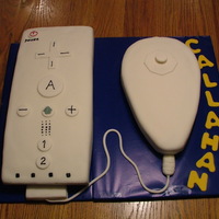 Wiimote And Nunchuk Chocolate and vanilla cakes covered in homemade fondant. Gumpaste and 50/50 details. Thanks to all the great photos on here for ideas!