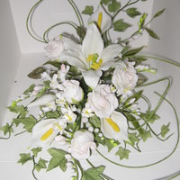 Bridal Flower Spray Bridal spray of roses, freesia and lillies made from porcelain paste.