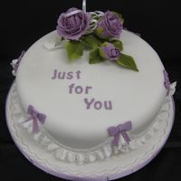 Celebration Cake With Tied Roses This is the second cake we made in my first class. Fruit cake with royal icing.