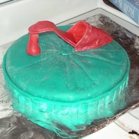 Pillow With Shoe I made this shoe with gum paste. I got the template from CC. To "glue" the shoe together I used gum paste powder mixed with a...