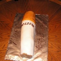 Smoke This is a 9x13 cak cut in half and layered. I used white chocolate plastic for the smoke and, I used gold wilton sprinkles for the tobacco...