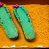 Flipflops.jpg 2-layer flip-flop cakes for a going away party. Sand is made from graham crackers and nilla wafers, with "Donna Was Here" written...
