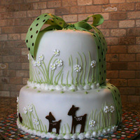 Willow Baby Shower Cake This cake was designed to match the baby-to-be's nursery. Fondant with brown fondant animals, buttercream details, and a ribbon (...