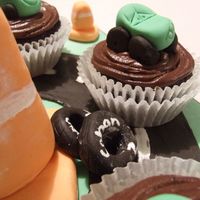 Race_Days_-_1.jpg 6 Gluten, Dairy, Egg, Nut Free Choccie Cupcakes and Frosting, iced cakeboard with modelling fondant characters and accessories. Cars was...