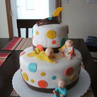 Baby With Mod Colors In Mind This was a so-so job. Cake was vanilla with strawberries, but the chocolate fondant was too stiff.