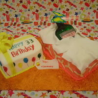 Remy Martin Cake Both cakes are choc with butter cream frosting all coverd in fondant, the bottle is made out of sugar, the lable is edible fondant. TFL