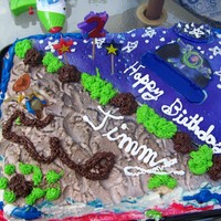 Toy Story 3 This is a whip cream cake. I do not recamend whip cream when it is warm out side as you wil see the cake is starting to melt. But the cake...