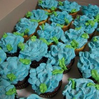 Cupcake Favors I did these cupcakes for the mom to give as favors for the wedding shower she put them in a cupcake box for each lady.Cupcake flowers