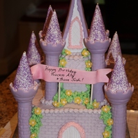 Lavendar Castle A small lavendar castle for a 5-year-old princess! This was an 8" with a 4" on top.