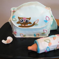 Owl Diaper Bag I did the diaper bag to match the decorations at my cousin's baby shower. The diaper bag and bottle are both cake.