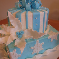 Winter Wonderland Buttercream cake with fondant accents and gumpaste poinsettia.