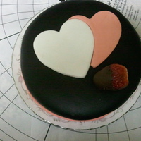 Happy Valentine's Day Granny This is a chocolate cake I made for my daughter's great grandmother. Covered in Duff's black fondant with wilton's fondant...