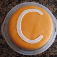 My Son's 3Rd Birthday Cake My son wanted an orange "MM' cake for his birthday. This is my first time working with fondant. The cake is a dairy free version...