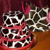 Giraffe Print Cake 3 Layer White & Chocolate Cake with Buttercream and Fondant Icing. Hand- Painted Giraffe Pattern with Gel Food Coloring.