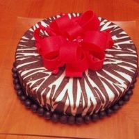 Zebra Pink Bow This was for my sisters 18th birthday. Her guidelines were pink and zebra, so this is what I did. This is my first zebra and bow.