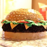 Father's Day Cheeseburger Cake This is my first non-traditional cake. I made it for my Dad for Father's Day 2009. The "buns" are white cake with...