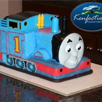 Thomas The Tank Cake This Thomas the Tank semi-custom cake was a hit for a couple of twin boys and their birthday party in Charlotte NC. There are a couple of...