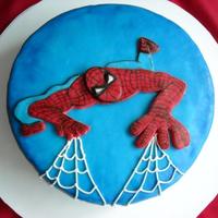 Spiderman vanilla cake, filled with dulce de leche. Spiderman in fondant... design from somewere on the web that the client gave me.