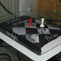 Twilight Birthday Cake Twilight birthday cake. Chocolate MMF with chocolate chess pieces.