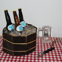 Beer Bucket Sugar bottles, jello ice, chocolate bucket using wood grain impression mat. Labels were fondant- ran out of time for anything else, and...