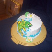 Koi Fish Cake done to mimic the tattoo my husband's 1st tatoo. Koi fish and lotus leaf. The colors are from his actaul tattoo. His birthday...