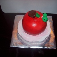 Teacher Appreciation Day Apple cake with a worm. Used the ball pan for the apple and petal pan for the base. Airbrushed. 1st time using the Viva method...loved it...