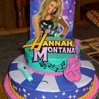 Olivia's 7Th B-Day Hannah Montana Cake White cake with Danish raspberry filling. Gumpaste and MMF accents