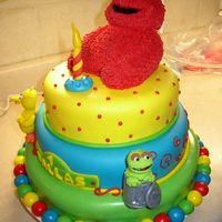 Sesame Street Very fun to make. Elmo is RKT and Big Bird and Oscar are gumpaste. Covered in MMF.