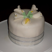 Calla Lilies This was my first attempt at using ribbon on a cake and making calla lilies.