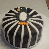 Penguin Cake Made penguin out of color flow icing. Rest is fondant.