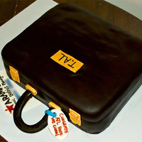 Briefcase Cake Customer requested this cake for her husband getting a new job. They were leaving town and she wanted to throw a party for him before they...